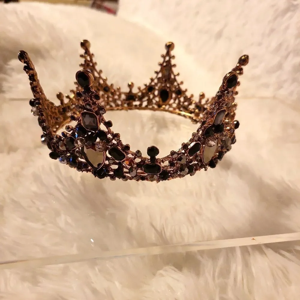 A full round tiara worn twice has 2 stones missing, beautiful!!!